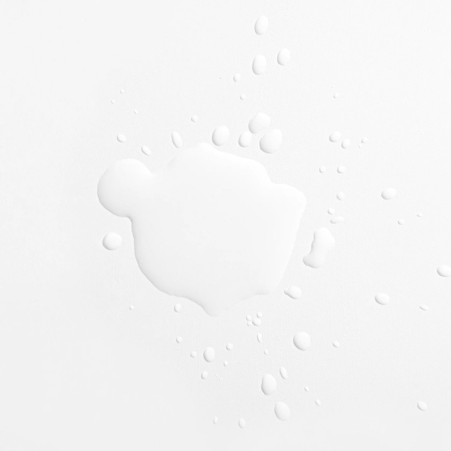Droplets of AlumierMD Bright and Clear Solution once dispensed
