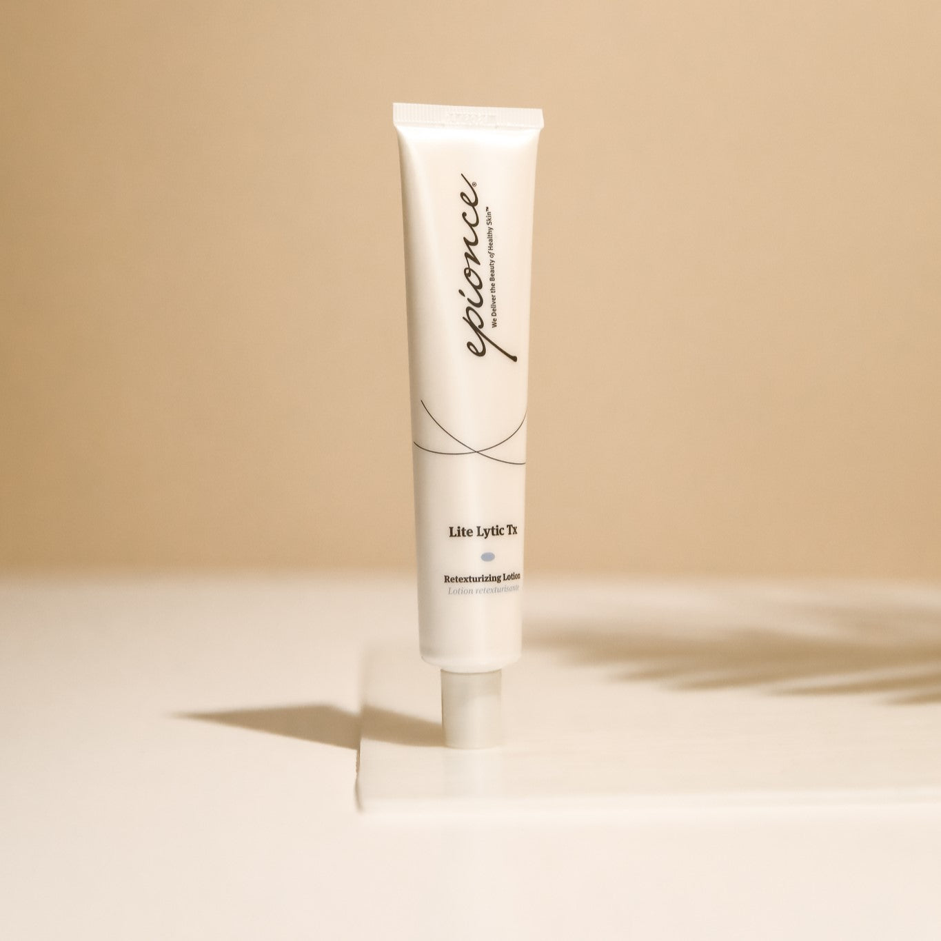 Epionce Lite Lytic Tx Retexturing Lotion on a lifestyle background