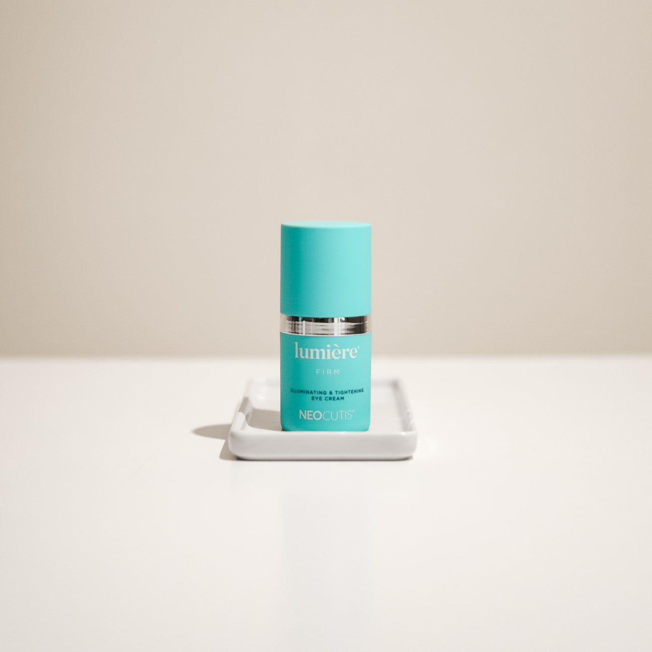 Lumiere Firm Eye Cream from Neocutis on a tray