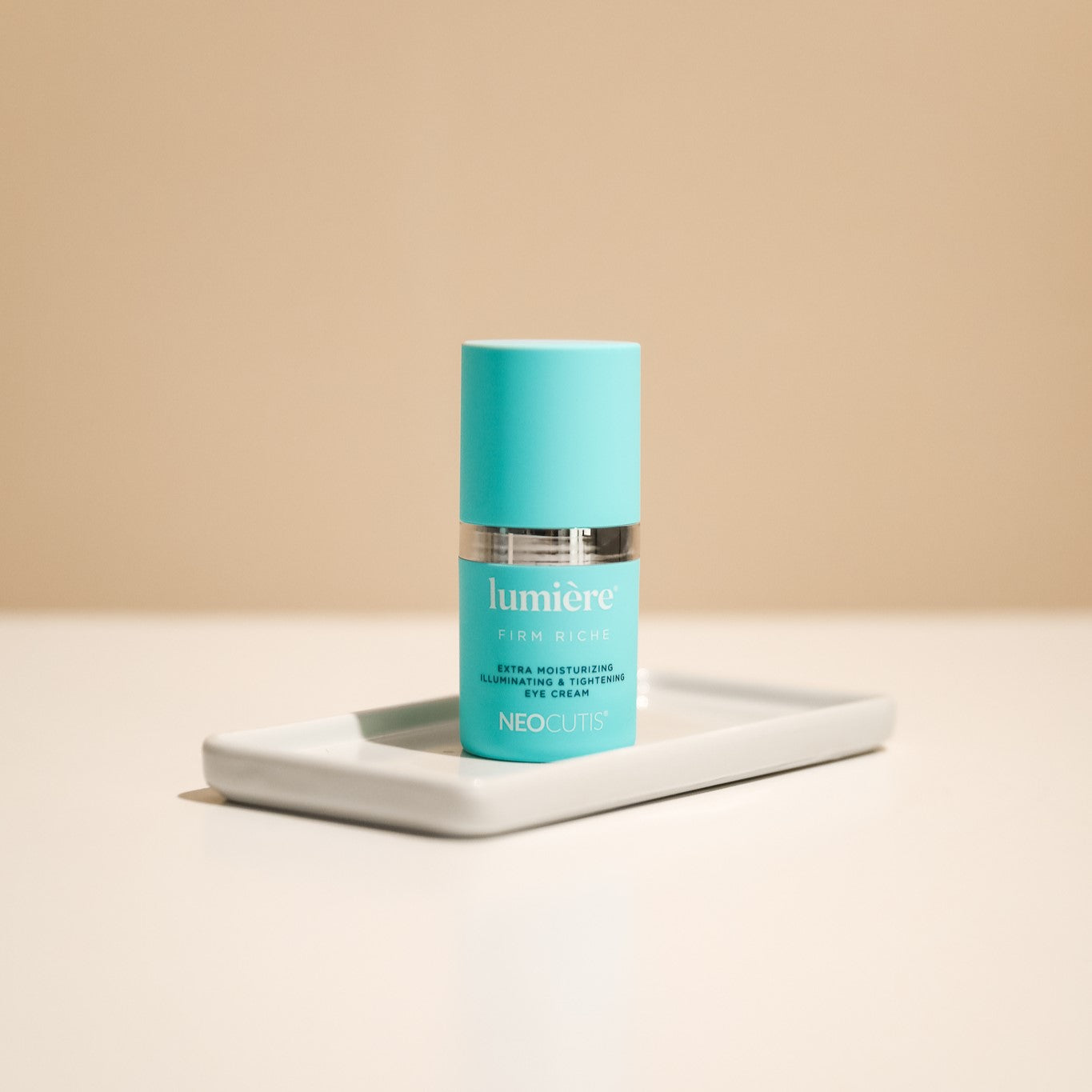 Neocutis Lumiere Firm Riche Eye Cream on lifestyle background