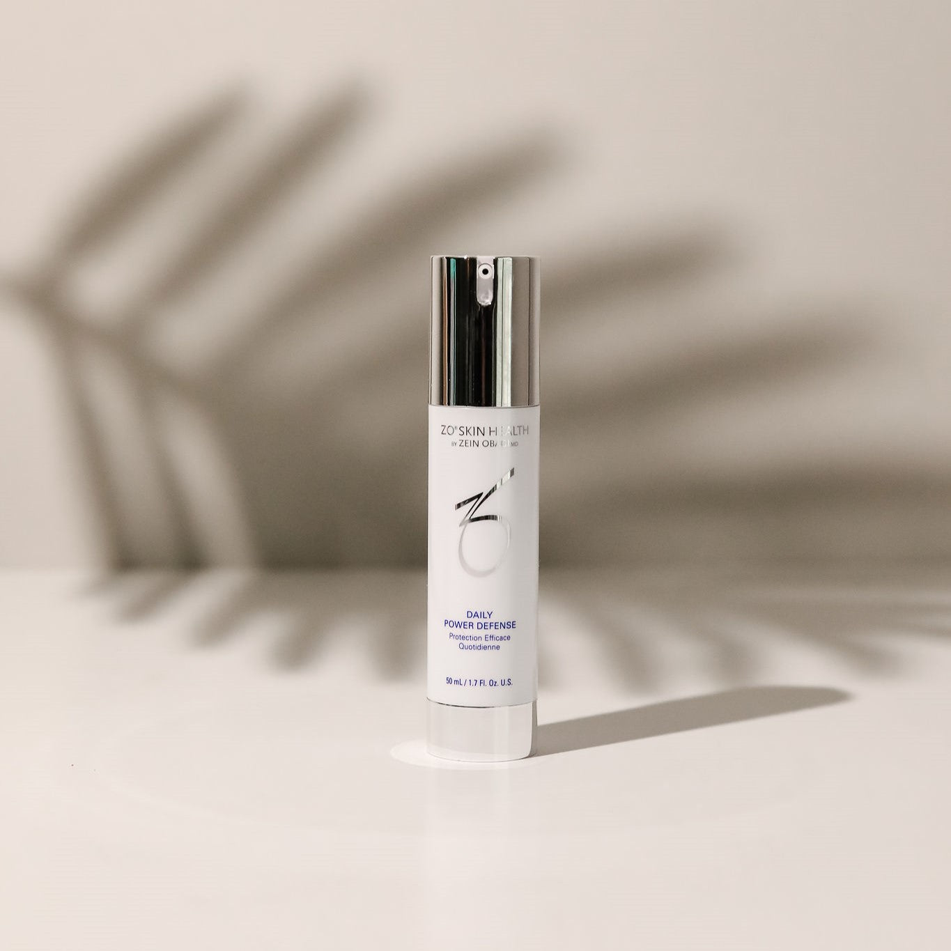 ZO Skin Health's Daily Power Defense Anti-Aging Serum on lifestyle background