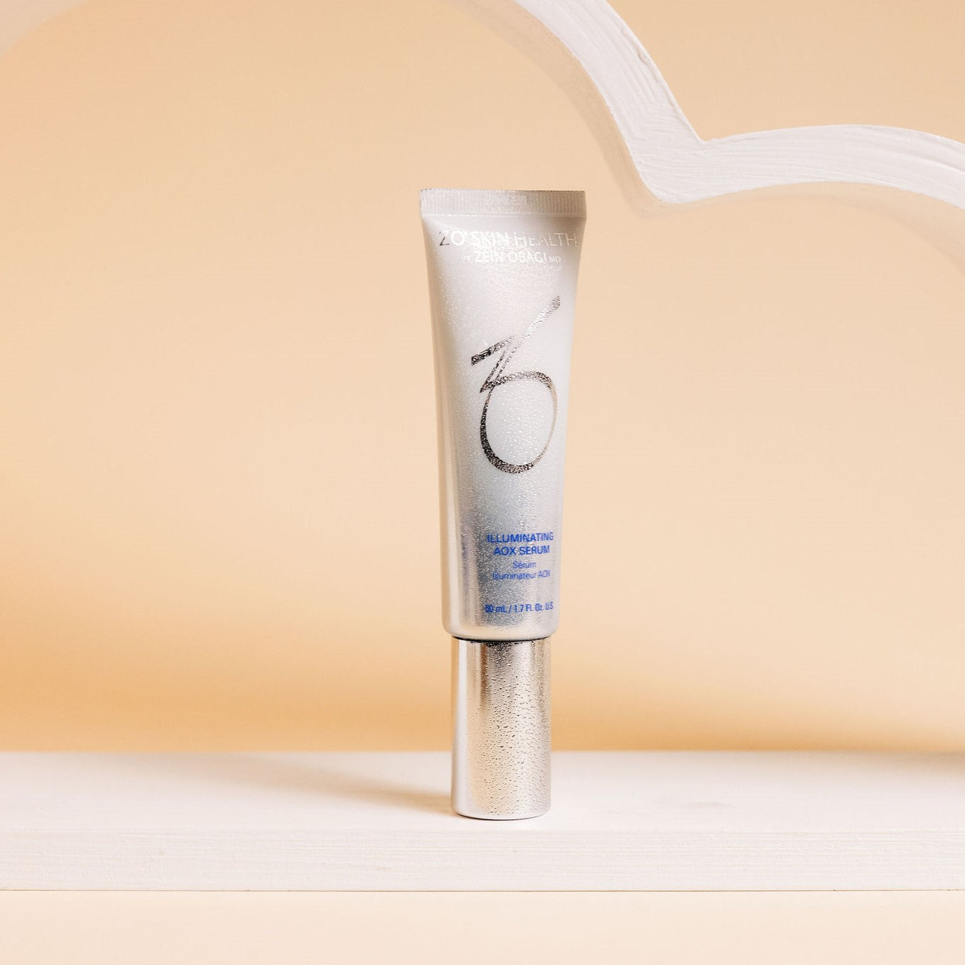 ZO Skin Health AOX Serum on lifestyle background