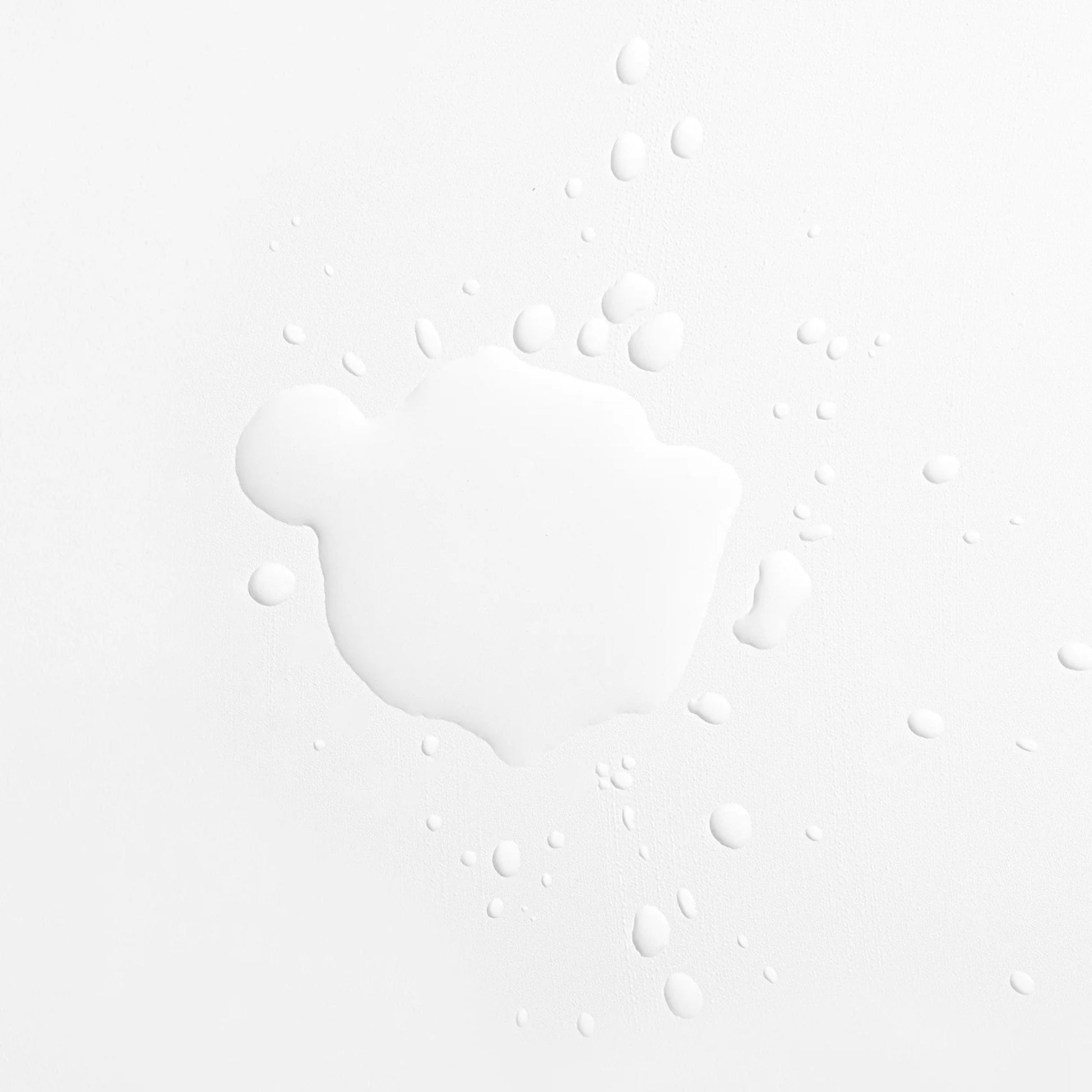 Droplets of AlumierMD Bright and Clear Solution once dispensed