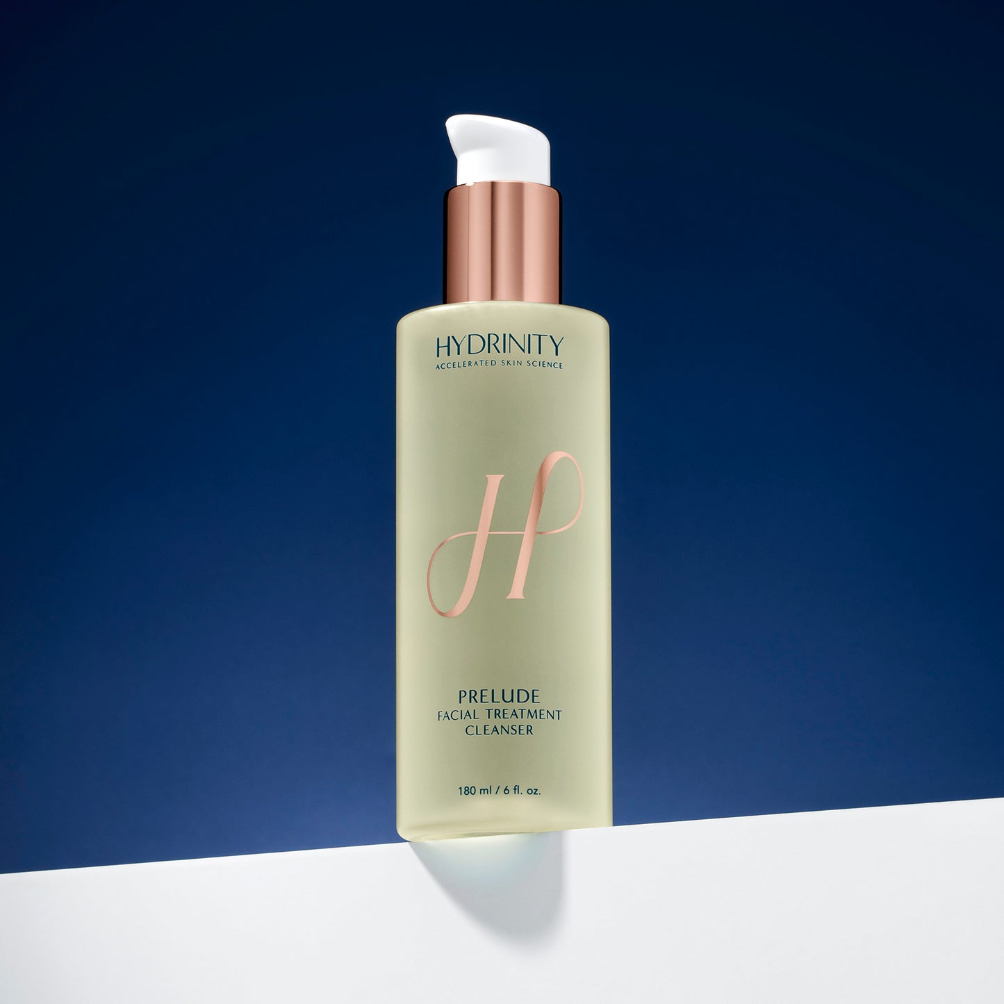 Hydrinity Prelude Cleanser on a blue background
