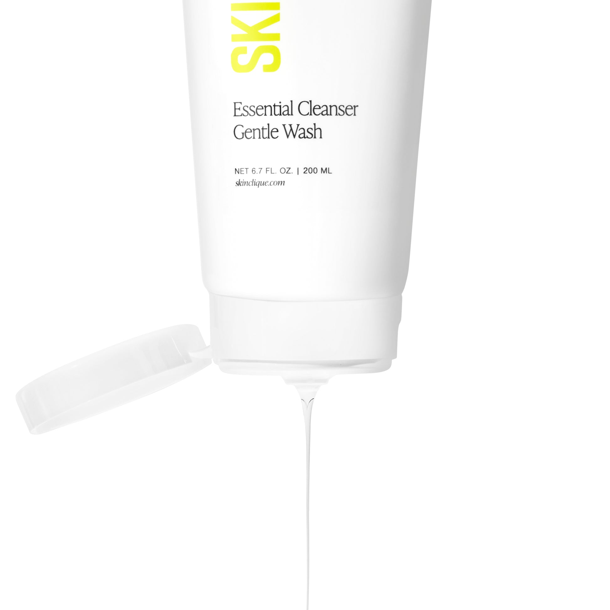 A product image of Essential Cleanser from Skin Clique being dispensed from the bottle