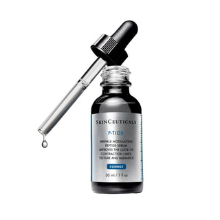 Open bottle of SkinCeuticals P-TIOX anti-aging serum with dropper