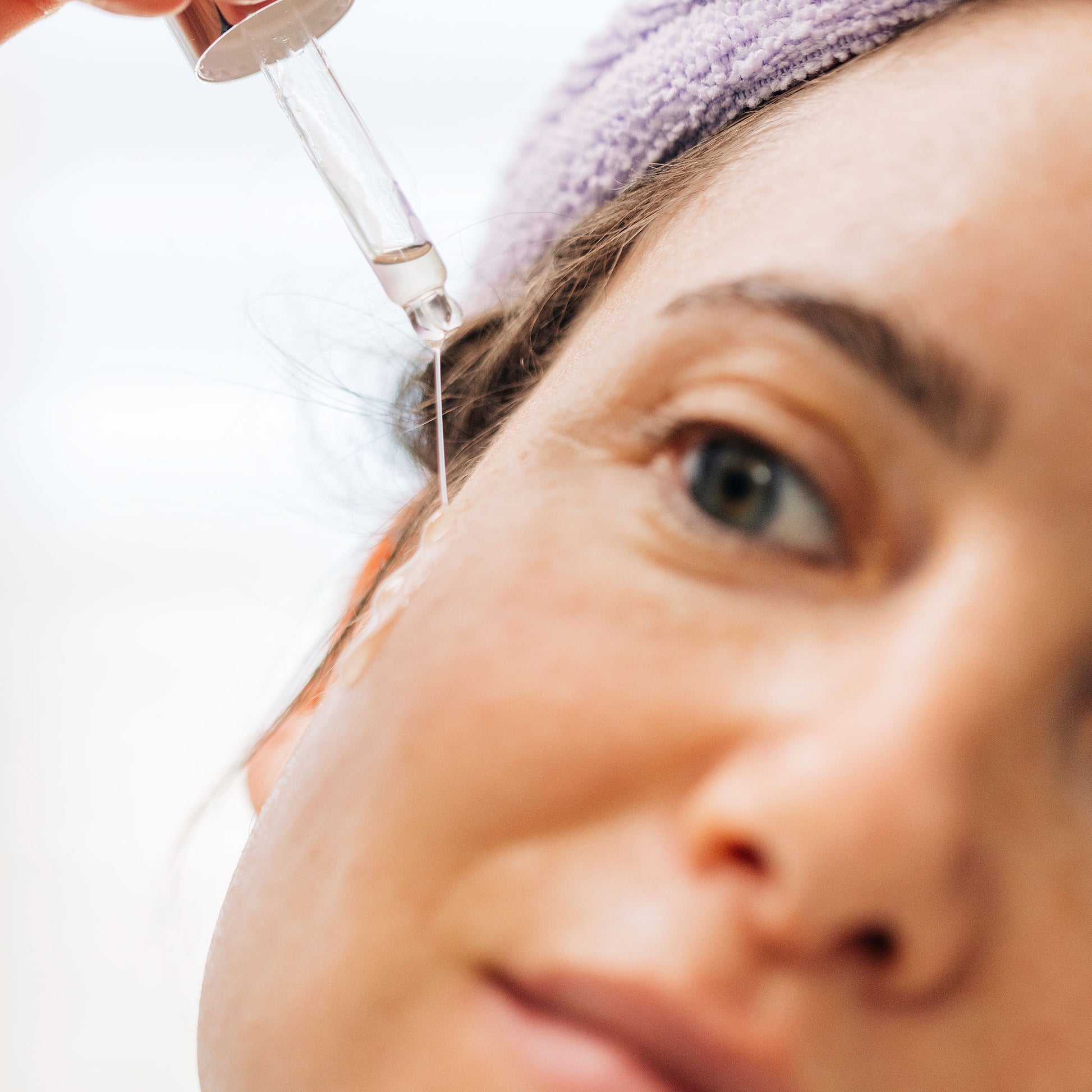 ZO Skin Health's Firming Serum Accelerated being applied to a woman's face